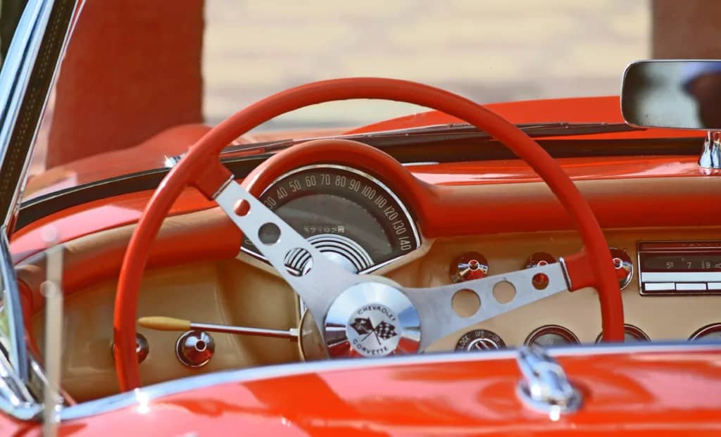 Rally Red Chevrolet Corvette, like the one in Yes, Dear by Lorrie Lush.